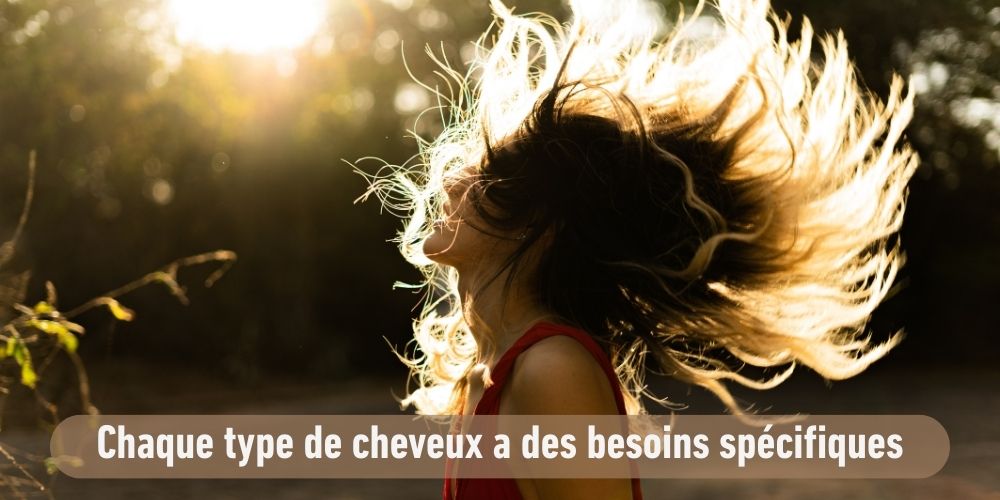 Cheveux brillants sous le soleil mettant en avant l'importance de prendre soin de ses cheveux grâce à la boutique J DE C 